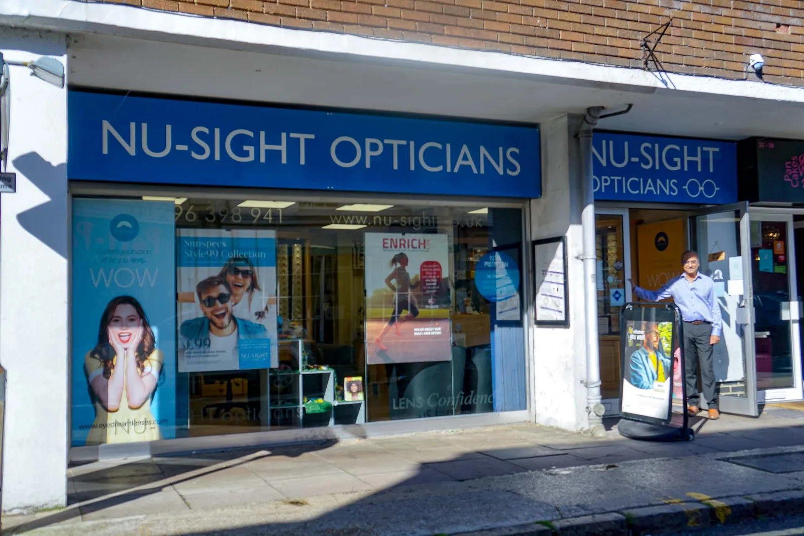 The blue Nu-Sight Opticians shopfront on Cambridge Street, Aylesbury