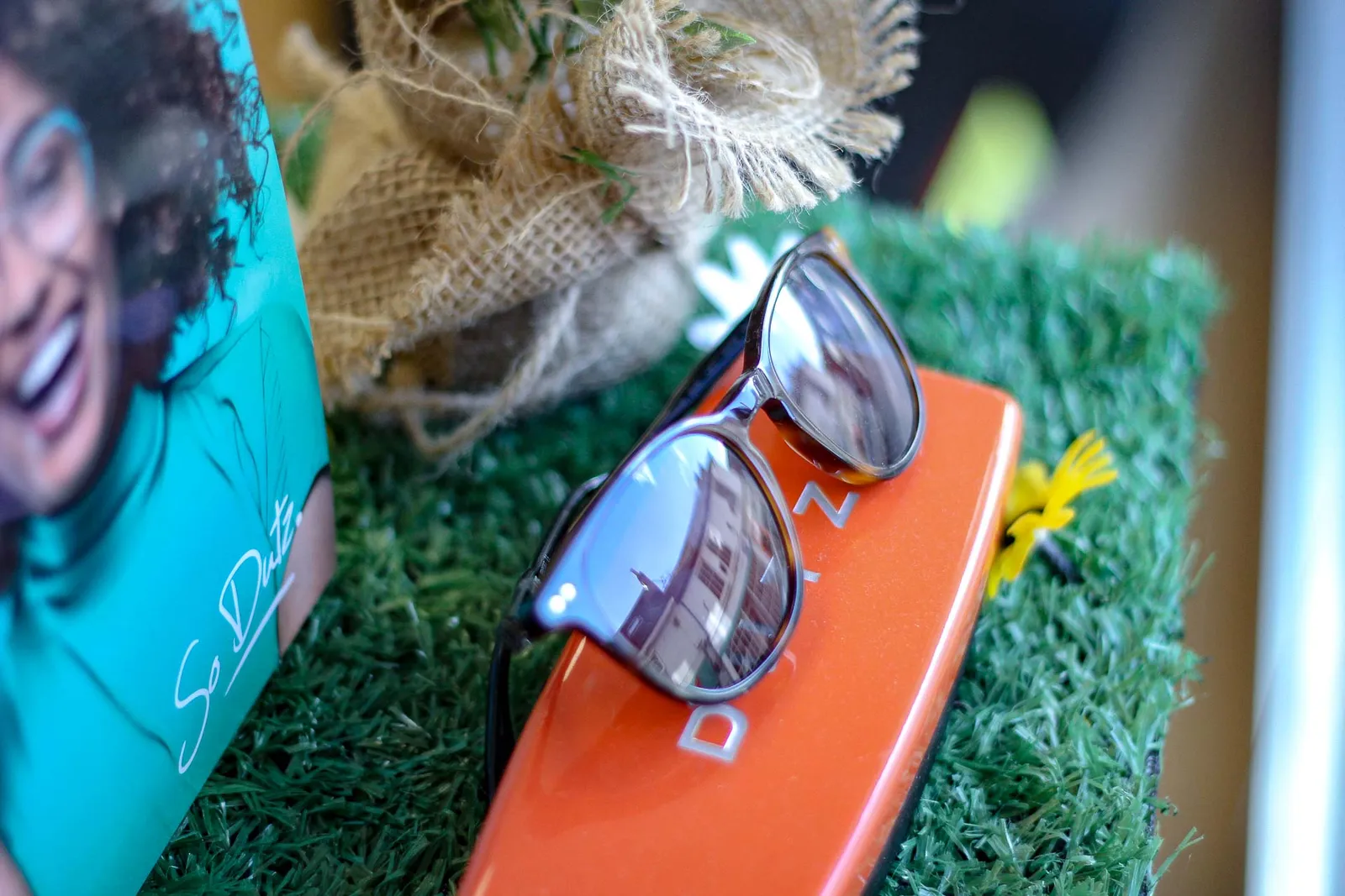 Prescription sunglasses on a display stand
